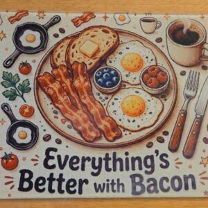Tempered glass cutting board featuring bacon, eggs, toast and coffee with Everything’s Better with Bacon text
