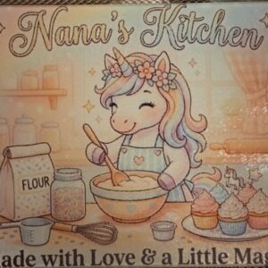 Pastel tempered glass cutting board with a unicorn baker and Nana’s Kitchen Made with Love and a Little Magic text