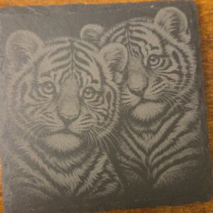 Square black slate coaster engraved with two realistic tiger cubs