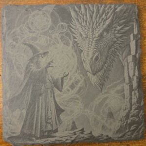 Square black slate coaster engraved with a wizard confronting a large fantasy dragon