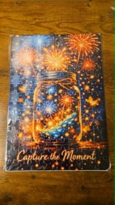 Colorful fireworks cutting board reading Capture the Moment