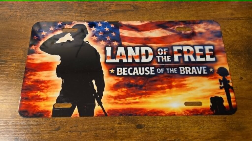 Patriotic cutting board reading Land of the Free Because of the Brave